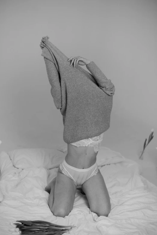woman wearing a panties upside down on the bed