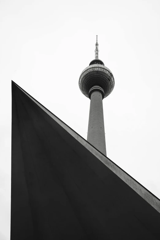 the top of a building with a large black cloth covering it