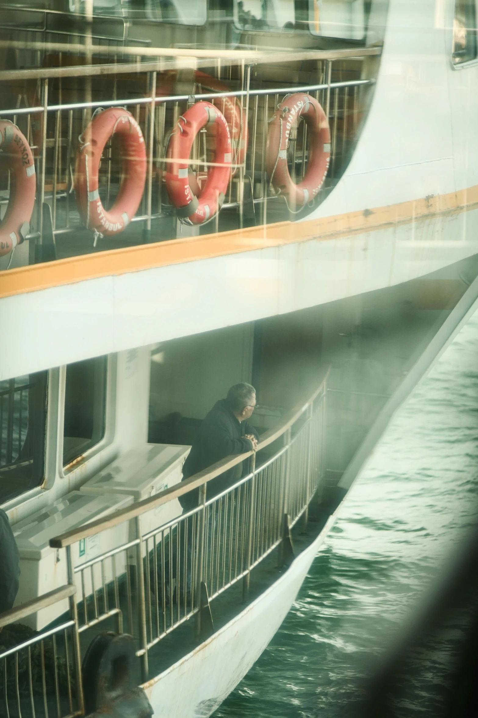 there is a white boat with some life preservers on the deck