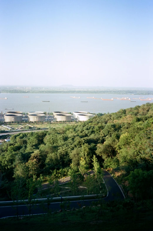 a po from the top of a hill that looks to have boats docked on it