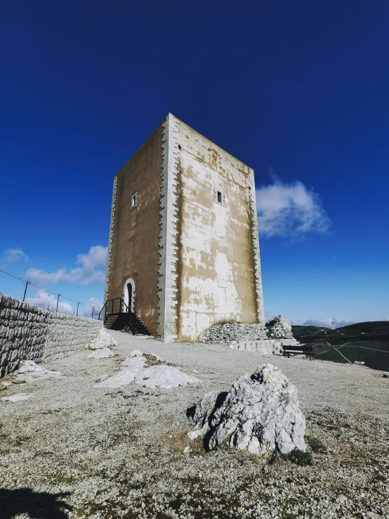 a building that is sitting on the side of a hill