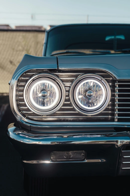 the front grille of a vintage mustang is shown