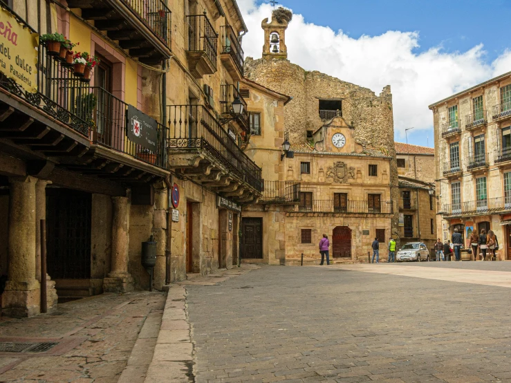 a deserted street with many different buildings