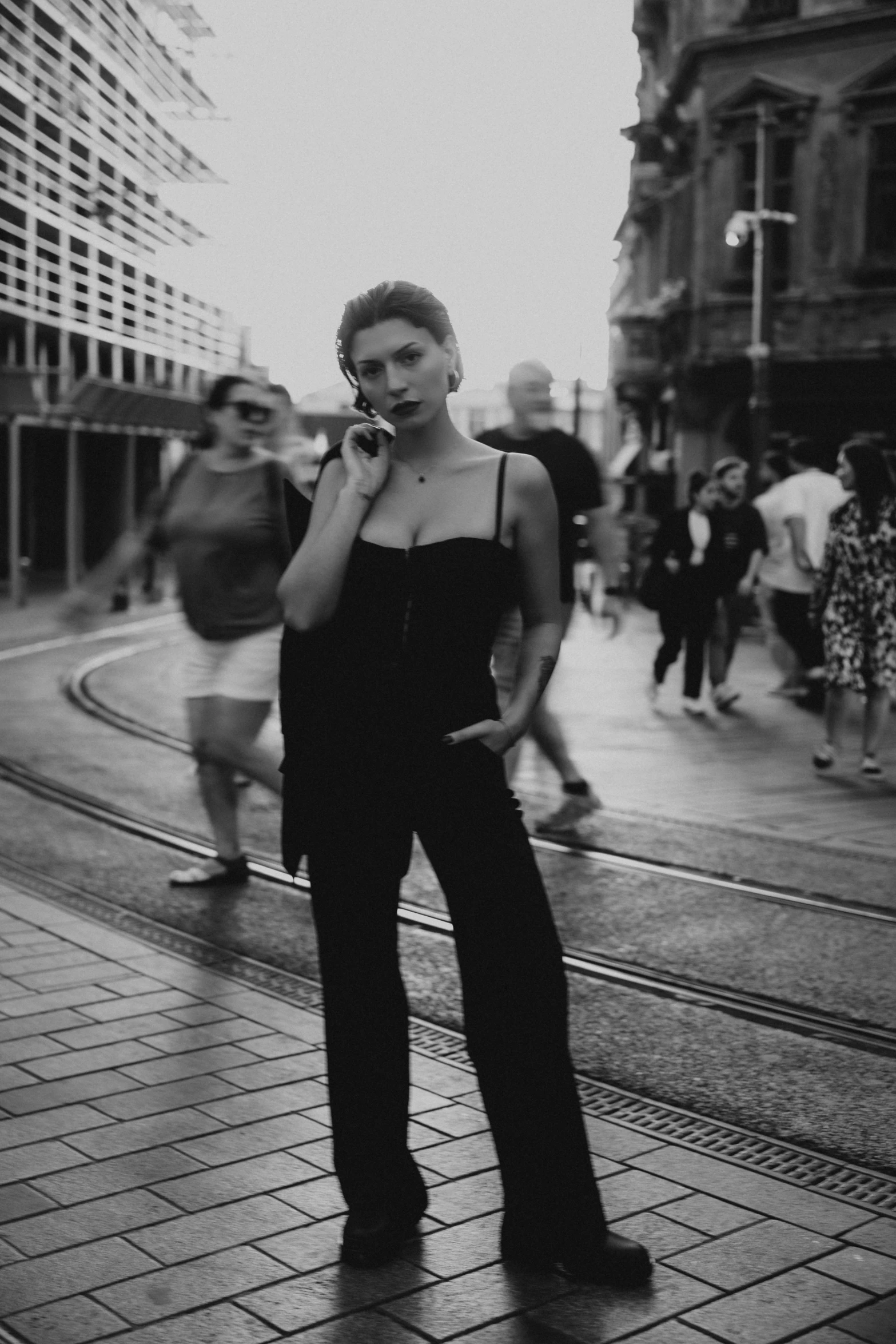 a woman talking on the phone while holding soing