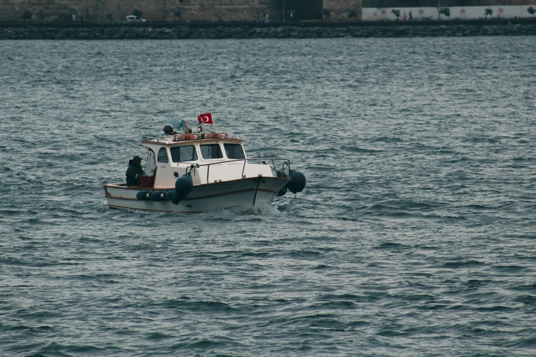 a boat floating in a body of water