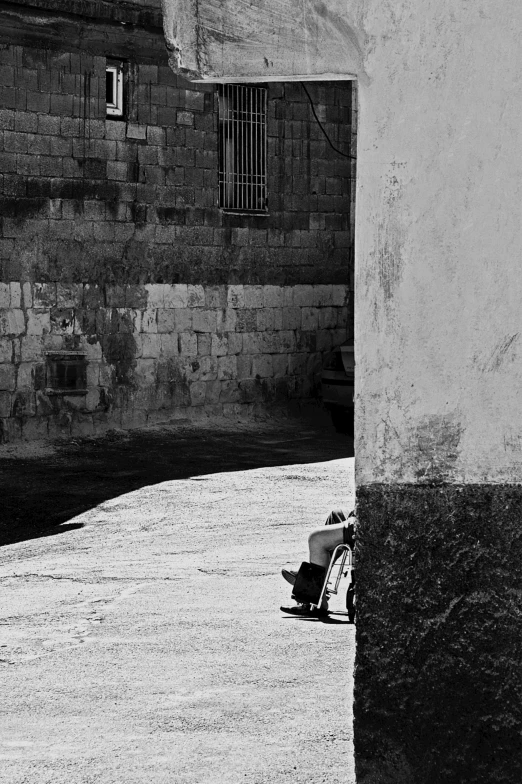 the shadows of two people and a motorcycle