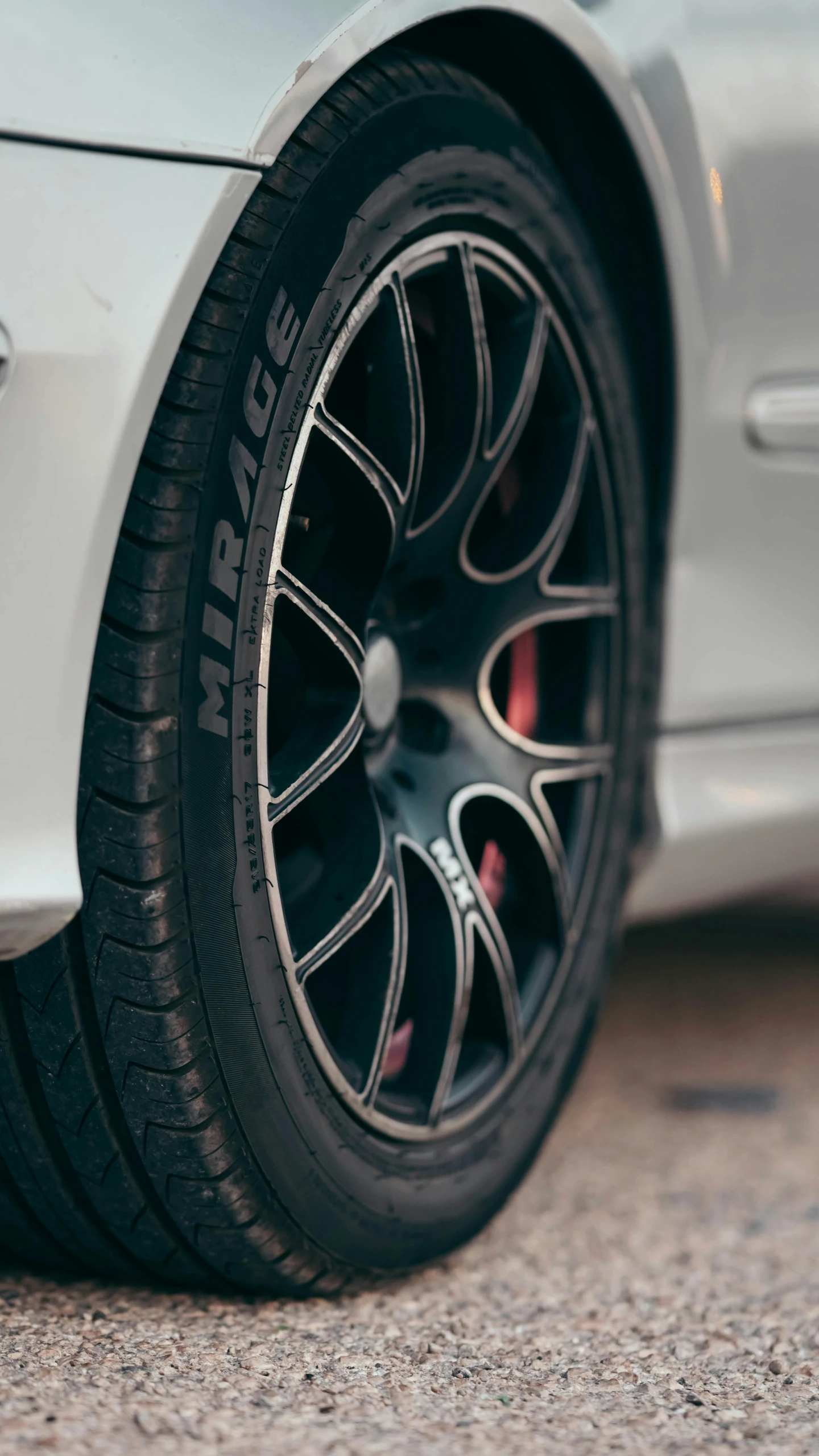 the tire and spokes of a modern automobile