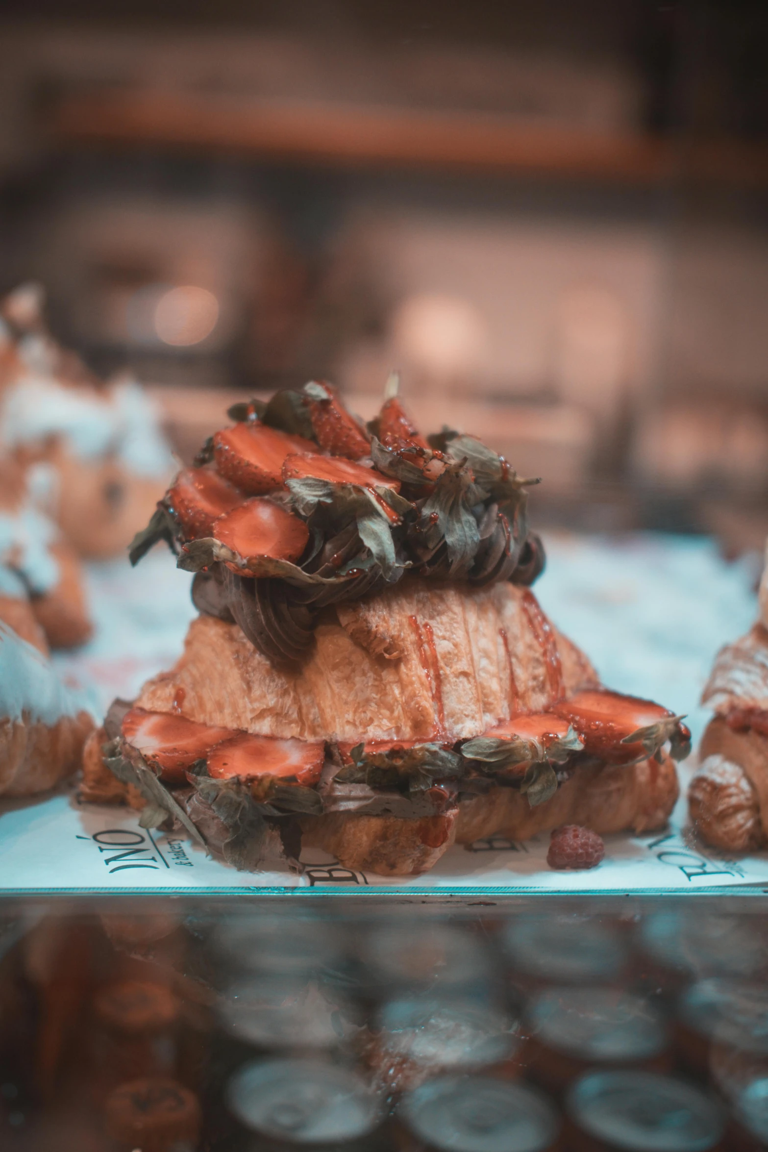 an image of meats and food items displayed in a display