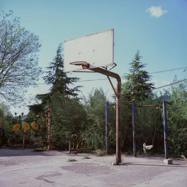 the basketball hoop is on the old street