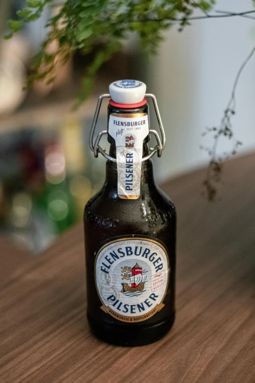 a bottle of beer sitting on top of a table