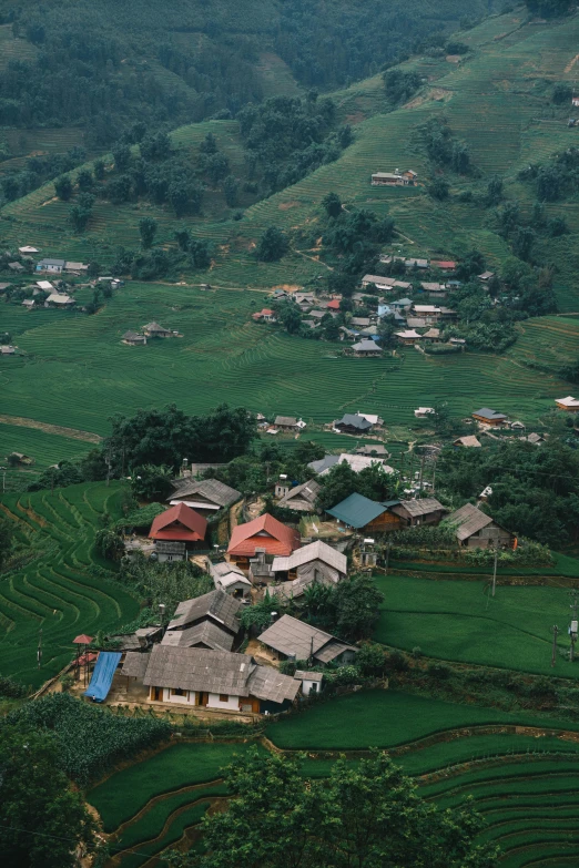 a village and farmland in an open field