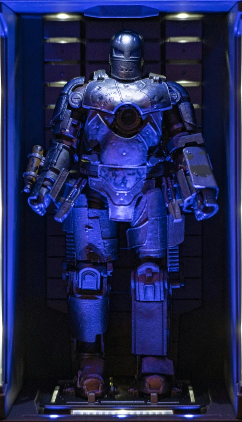 a man in futuristic armor in a box