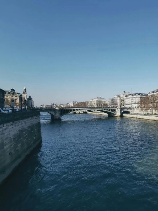 a long bridge that is over some water