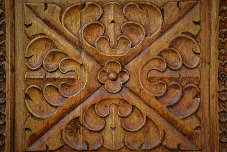 the carving work is done on the wood