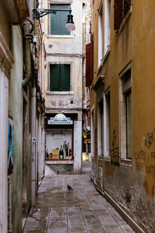 an old, stone building and sidewalk in a european city