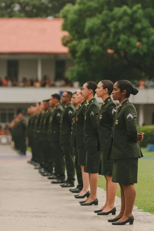 the group of women are dressed in uniforms