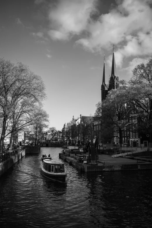 a black and white po of a boat in the water