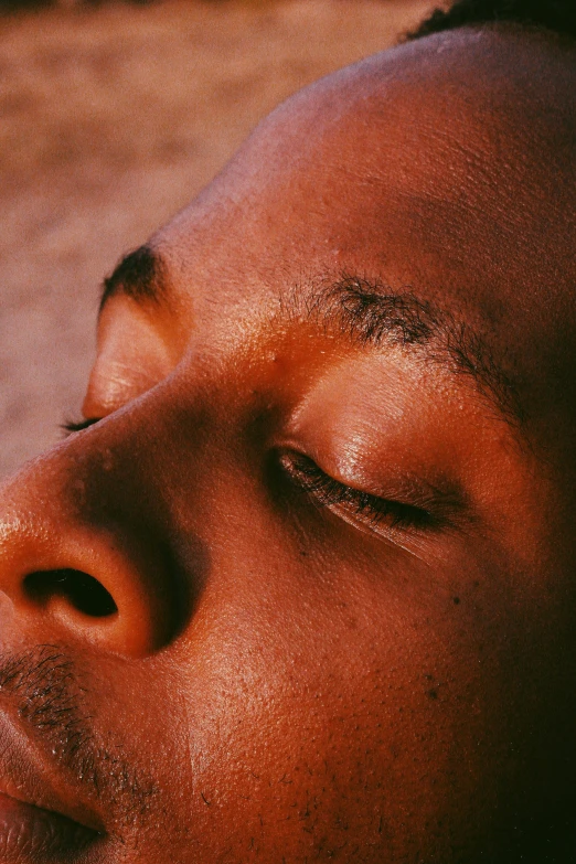 a close up of an african american man's face