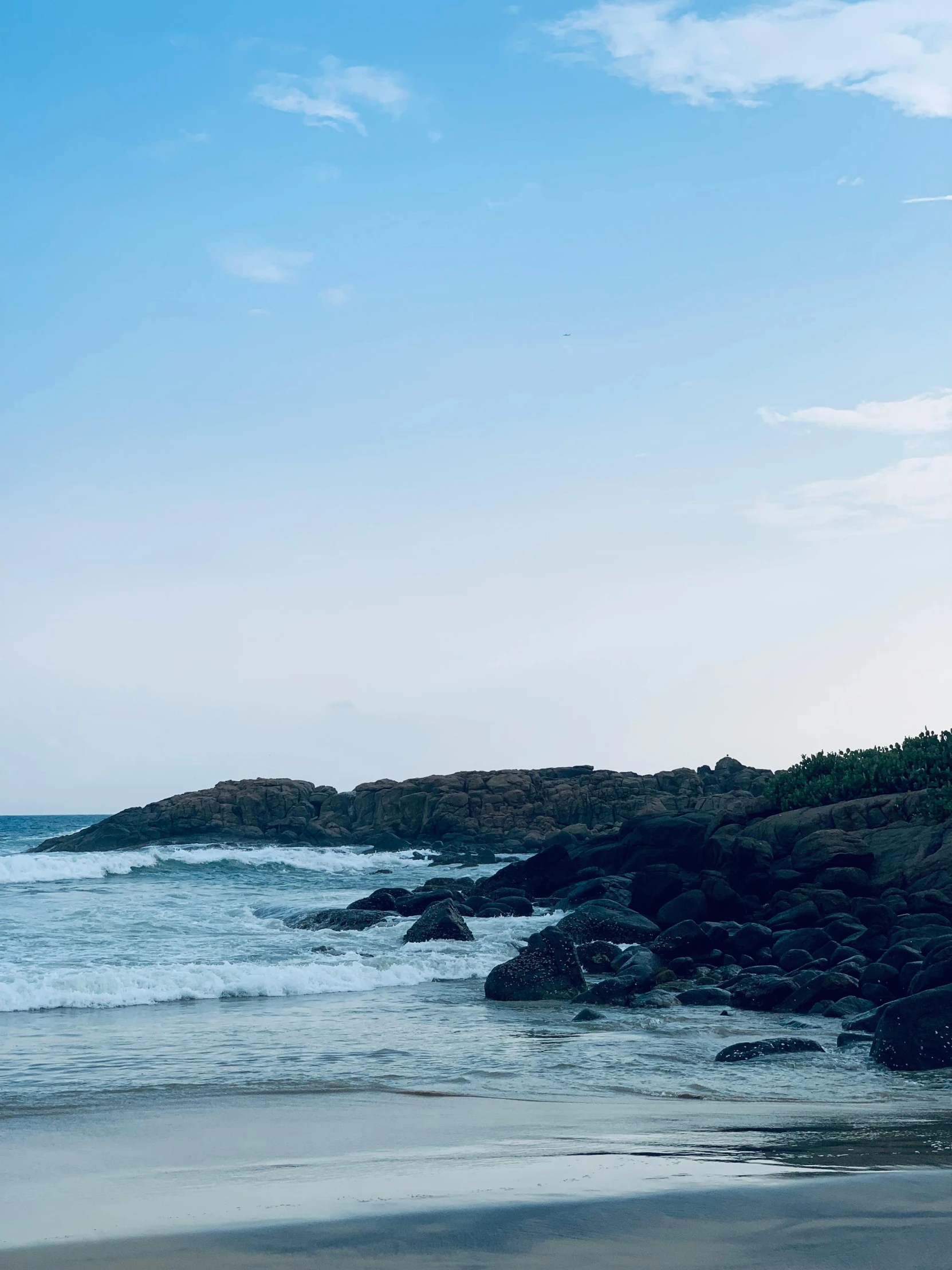 a view of the ocean from the shore