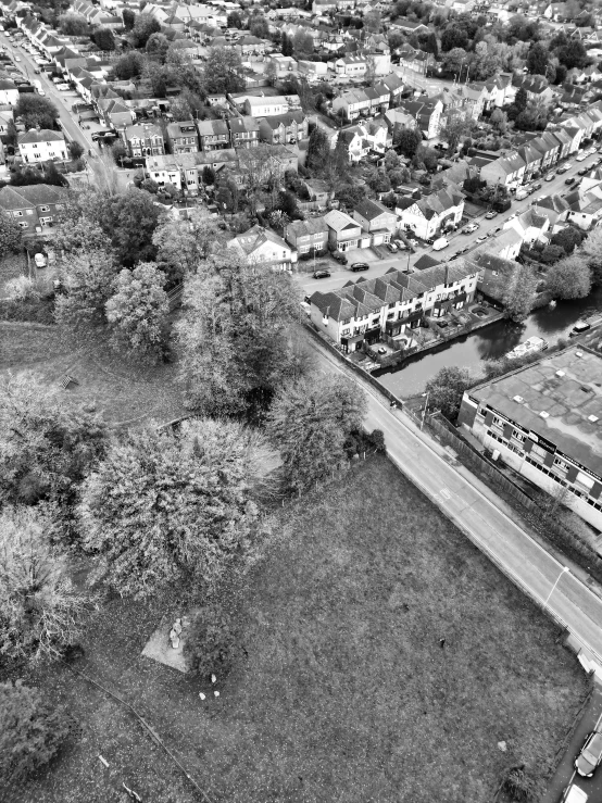 an aerial view of a neighborhood with lots of trees