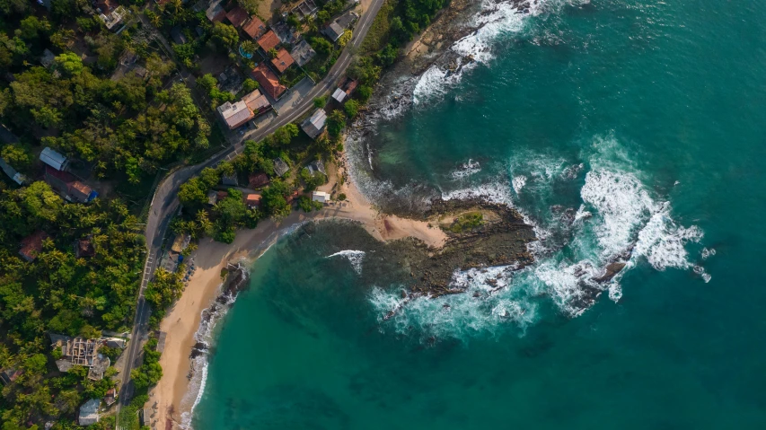 an aerial s of a coastline that stretches out to the ocean