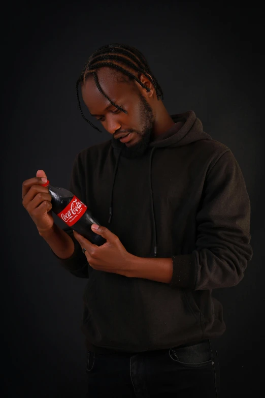 a man holding an electric cigarette in one hand and a lighter in the other