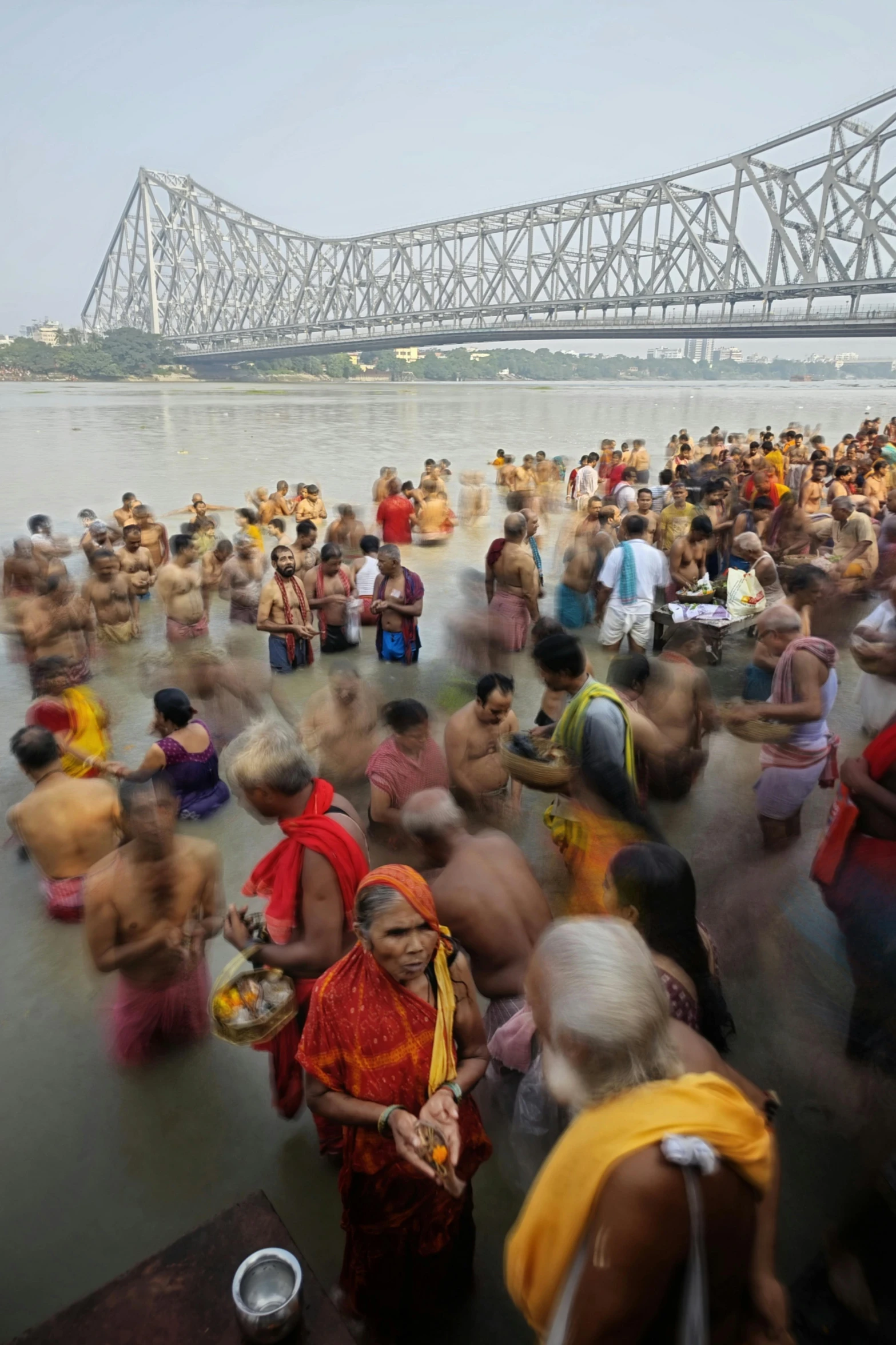 a large crowd of people that are in the water