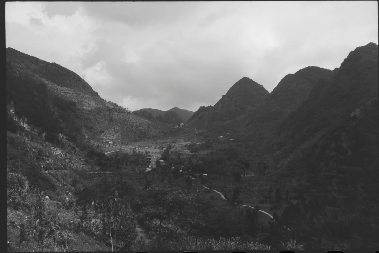 a black and white po of mountains and hills