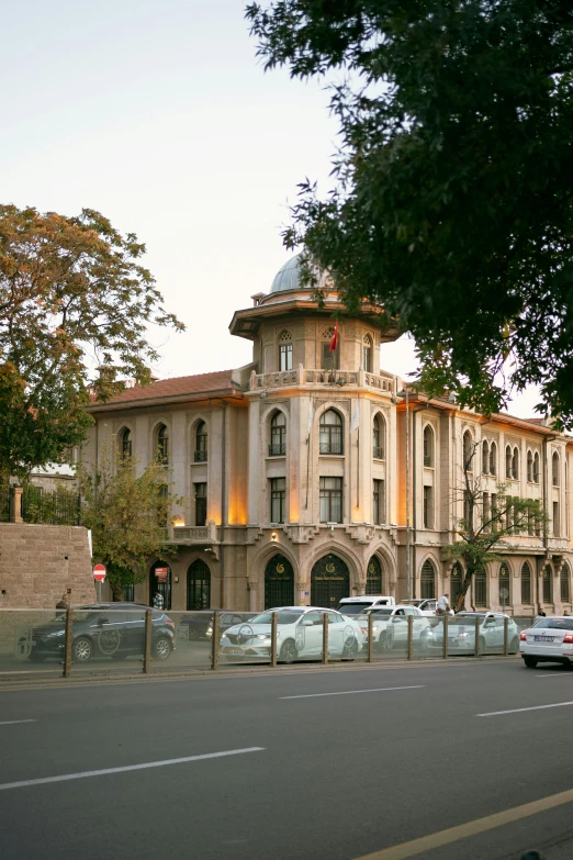 an old building is on the street corner