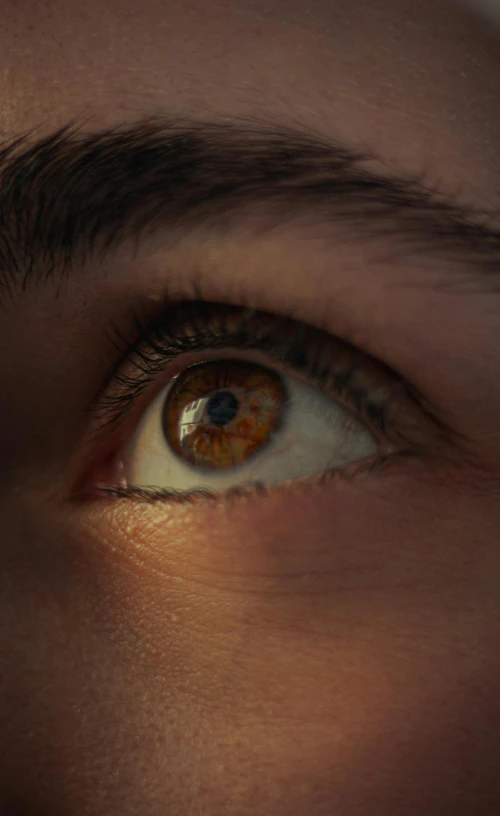 a close up image of a persons eye