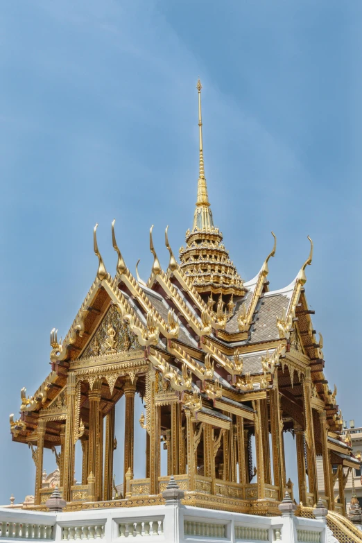 an ornate building with a clock on top