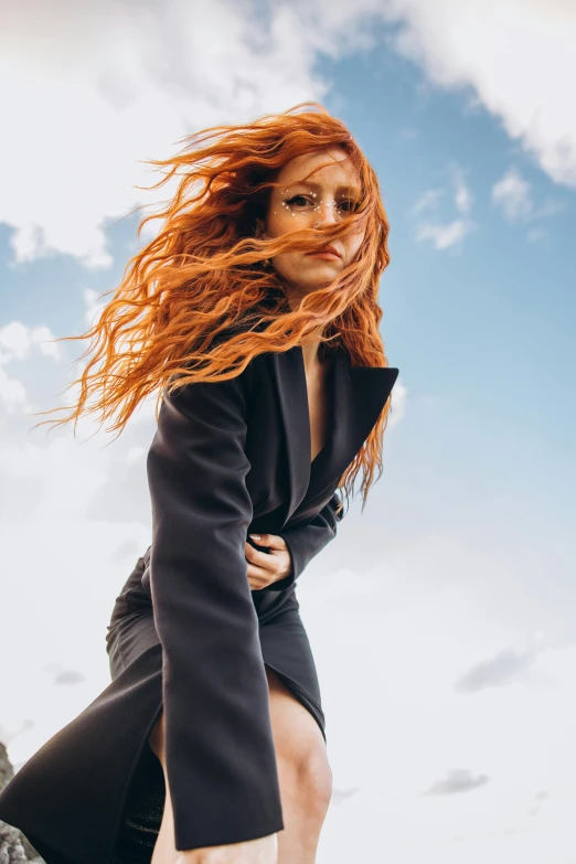 the woman is posing in the middle of a high jump