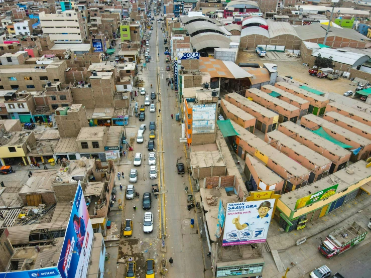 an aerial view of a street of poor looking city