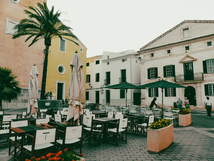 the view of a restaurant and patio in old town