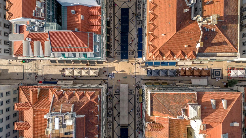 aerial view of buildings from high up looking down on a street