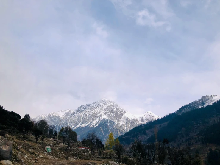 a very scenic view of mountains covered with snow