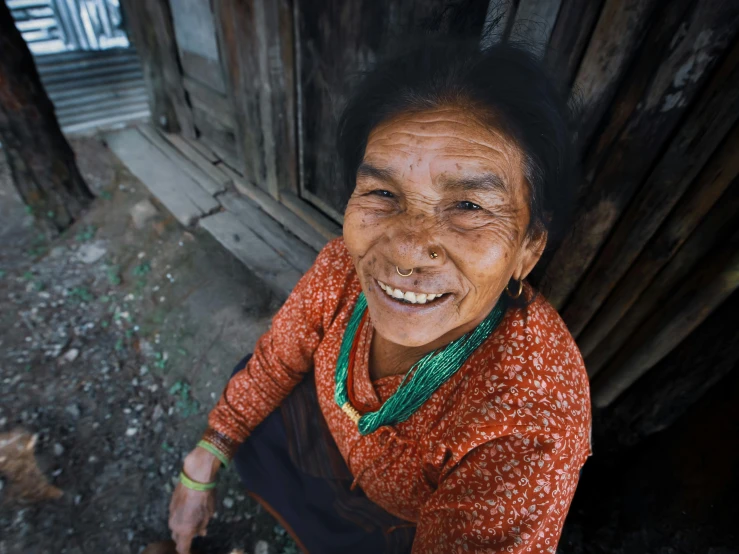 a woman with an interesting smile on her face