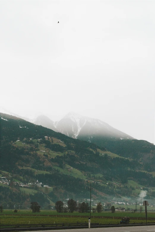 a mountain with a clock tower in the middle