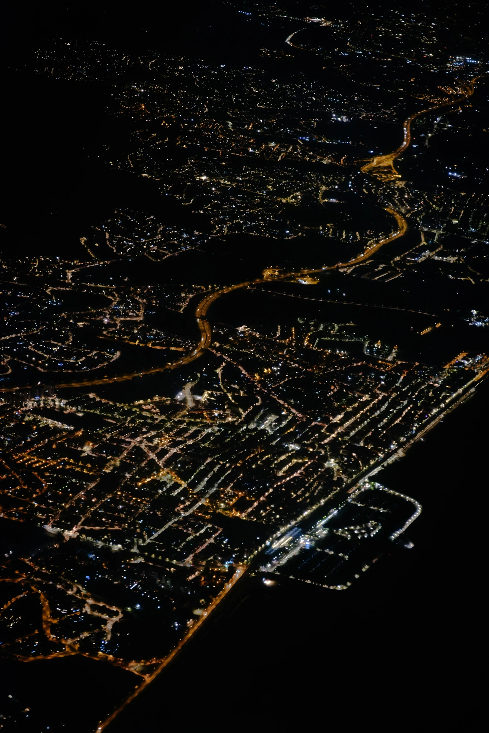 an aerial view of a city at night