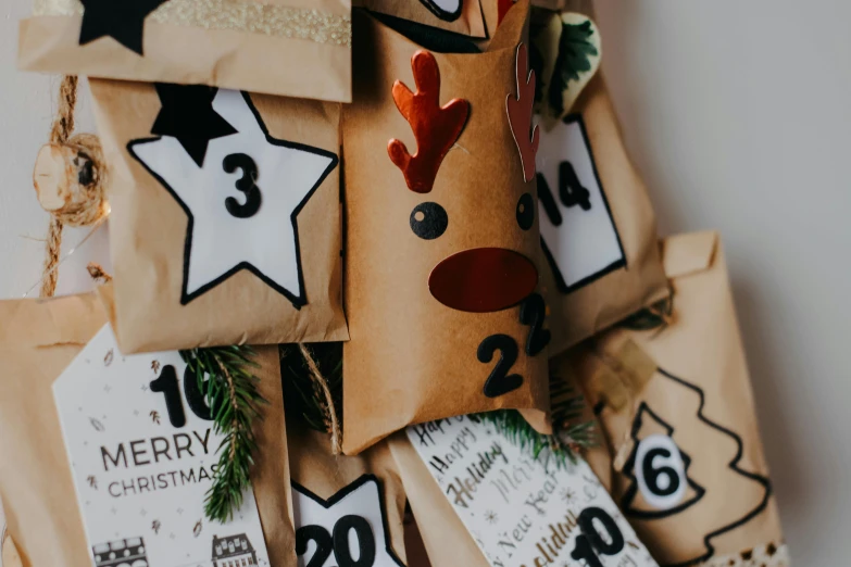 brown bags with numbered numbers decorated with reindeer