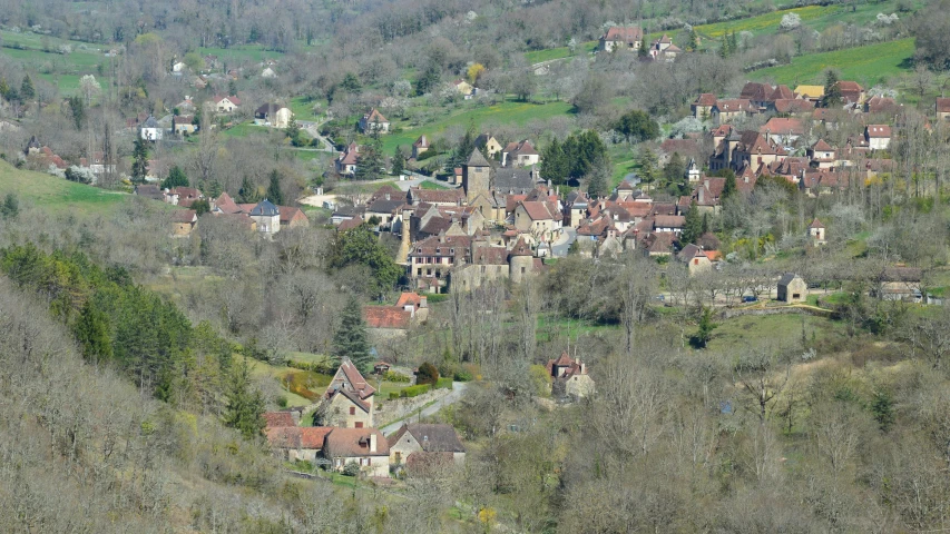 an overview view of some old town from the hill