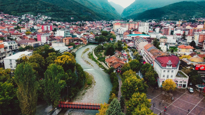 a small river running through a small village