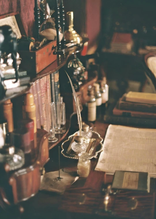 a bunch of old bottles and silverware on a table