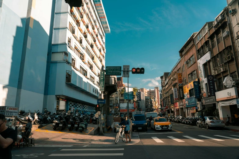 traffic at an intersection on a busy city street