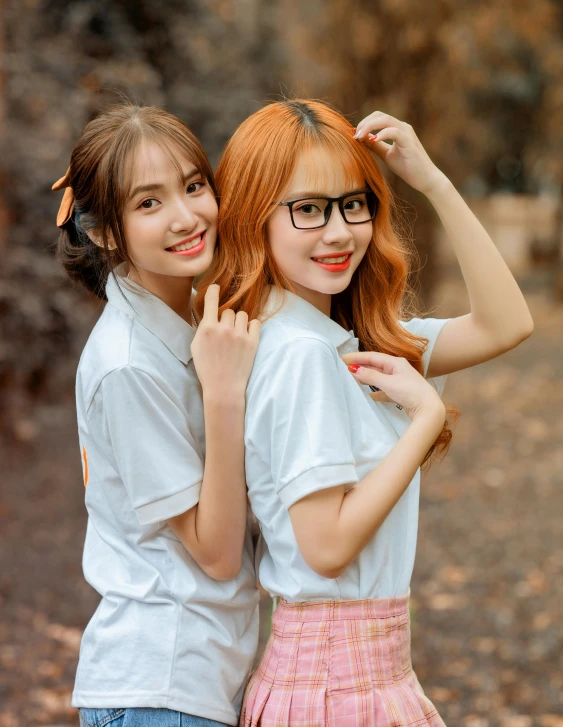 two girls are posing for a po together