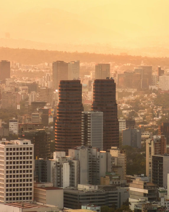 city buildings at sunrise in a cloudy city