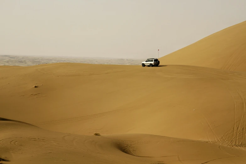 the view from behind of a car on a desert