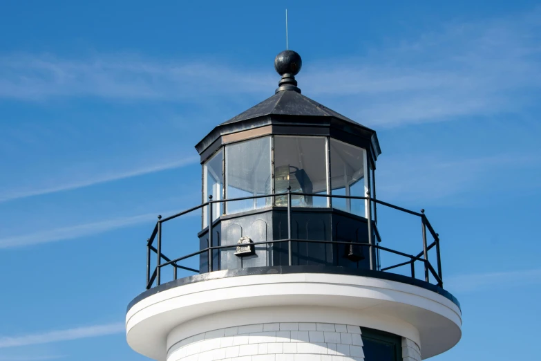 a tall tower sitting on top of a roof