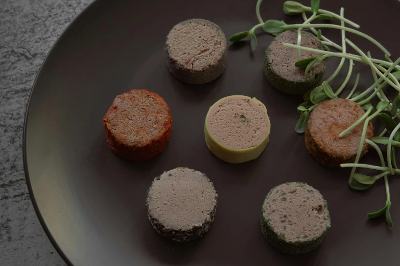 an arrangement of appetizers are arranged on a plate