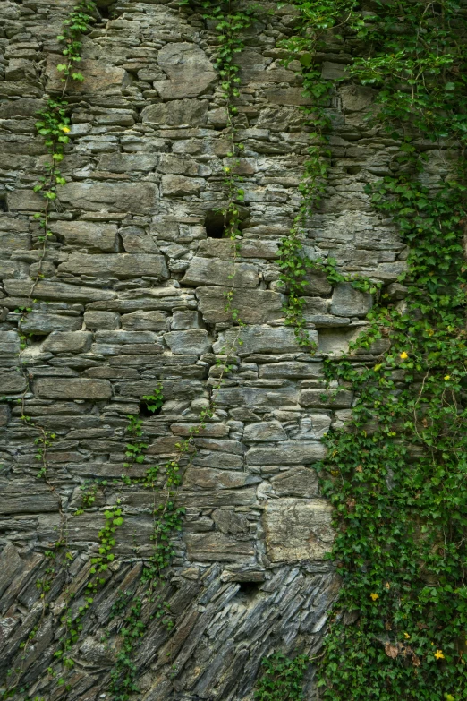 an up close view of a wall made out of stone